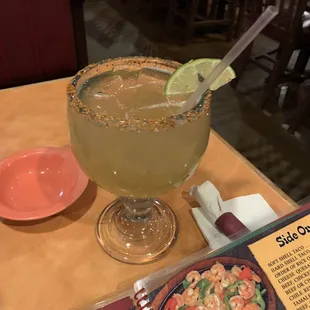 a picture of a margarita and a menu