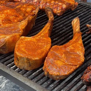 meat being cooked on a grill