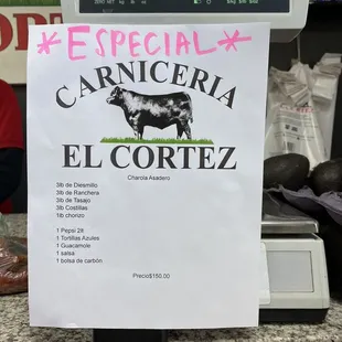 a sign on a cash register