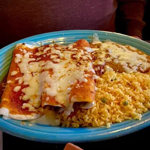 Three Enchiladas (one beef, one chicken, one cheese)with beans and rice
