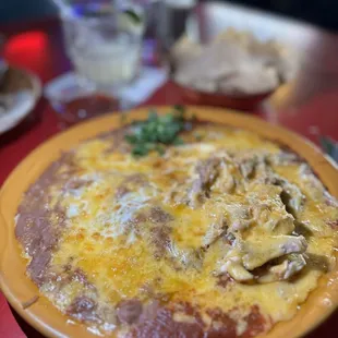 Chicken enchilada with extra beans