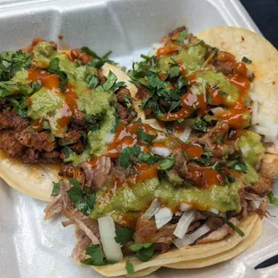 Chicken, carnitas, and al pastor. Christmas style. Aka red and green hot sauce.