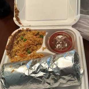 a burrito with rice and vegetables