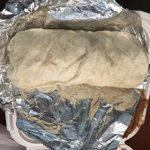 a burrito wrapped in foil