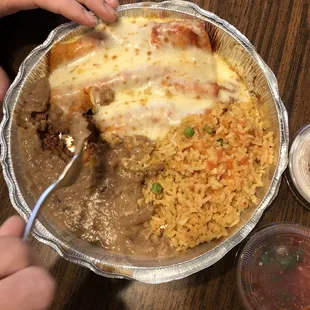 Enchiladas, meal with rice and beans