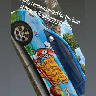 a car painted with a cartoon character