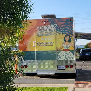 a food truck parked in a parking lot