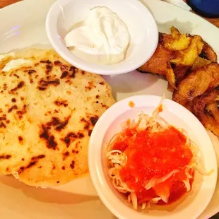 Kids item- 1 cheese pupusa and platanos (plantains) side of cream and Curtido