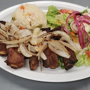 Costillas de cerdo  Encebolladas