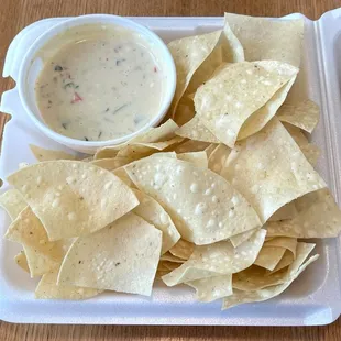 Complimentary Chips with Espinaca Dip (Free with Entrée or Purchase over $12)