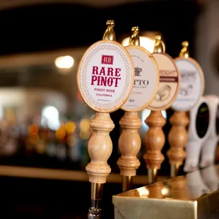 a row of beer taps