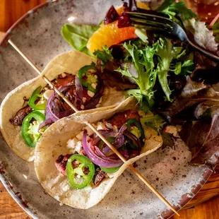 a plate of tacos