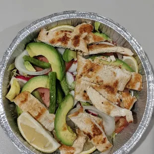 Avocado salad plus grilled chicken. It came with lemons but no salad dressing.