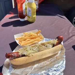 Spicy Polish with grilled onions and fries