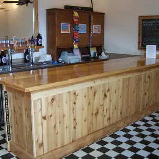 a bar with a checkered floor