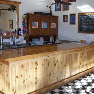 a bar with a checkered floor