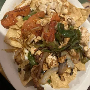 1/2 portion Fajita Nachos. The chicken tasted a bit off