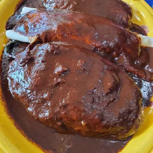 Mix and match pork tamal, chix burrito, and chile drowned in mole