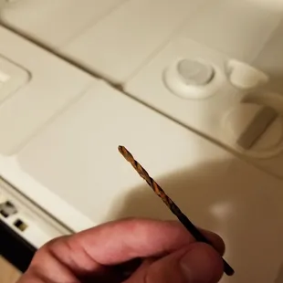 Rusty drill bit found in dishwasher