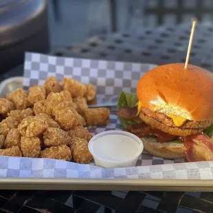 a burger and tater tots