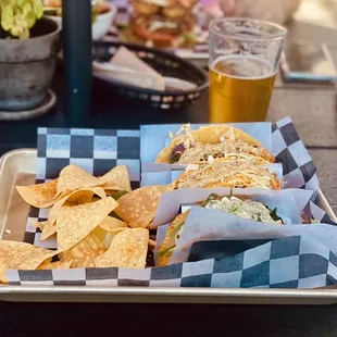 a tray of nachos and chips