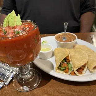 Shrimp cocktail and tacos Al pastor