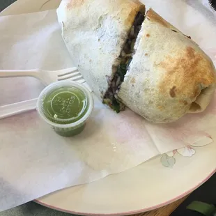 a burrito on a plate
