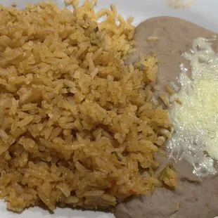 Side of rice and refried beans
