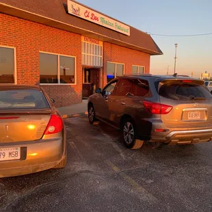 two cars parked outside