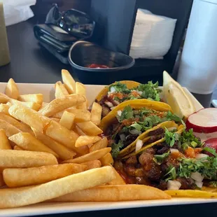 Taco special &quot;pastor&quot;  Taco special comes with three tacos, fries, and a drink.  You can beat this with a stick.