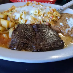 Fajita steak with chilaquiles breakfast