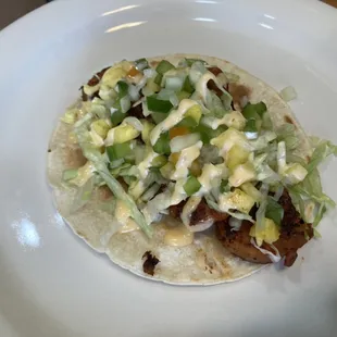 Fish taco, tilapia, chipotle mayo, house slaw on flour tortilla