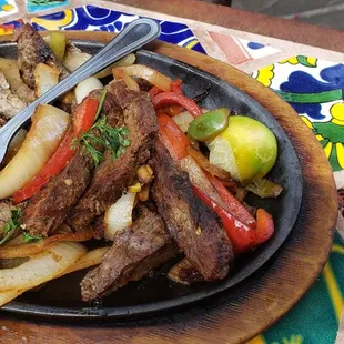 Beautifully carmelized onions, big chunks of peppers, and THAT BEEF!!!