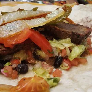 My fajitas - beef is mesquite smoked in-house... daydream about it!