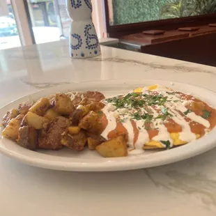 Huevos rancheros with potatoes