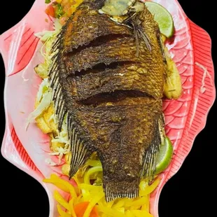 a whole fish on a plate