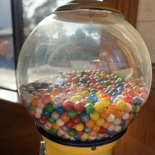 Inexplicable gum ball machine in corner