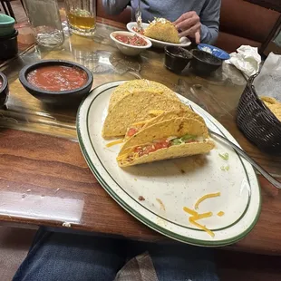 Crunchy beef tacos with far less filling than they normally serve.  Come on!