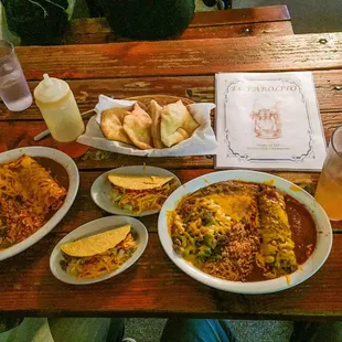 Taco, chile relleno, enchilada, rice and beans, sopapilla , Xmas style.