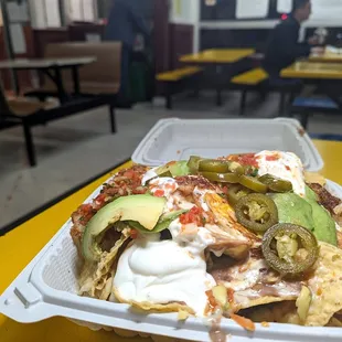 fried egg super nachos $9.25
