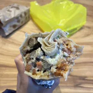 Lengua Super Burrito $13.25 bc they charged $2 more for lengua. Notice the large tortilla clump :/