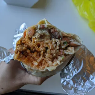Al Pastor burrito - 4 stars. Good kick of spice! Fri takeout lunch 2022-05-13