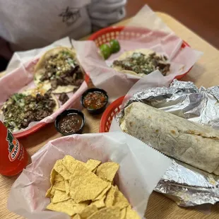 a burrito, tortilla, and chips