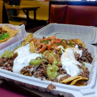 Super steak nachos $10.50 (No fried egg at this location)
