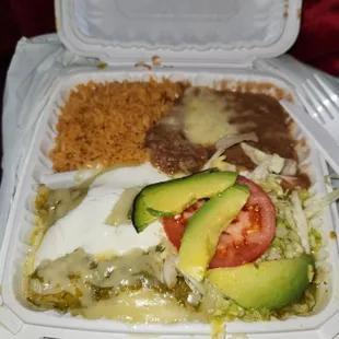 Green chicken Enchiladas plate, to go. So delicious