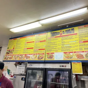  man standing in front of a menu