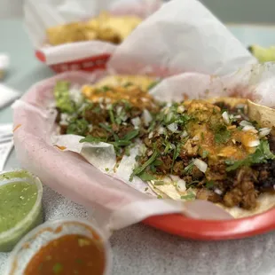 2 al pastor tacos filled me up; like I ate 4 of them. This place fills it up w the meat BUT charges 65cents for the chips!