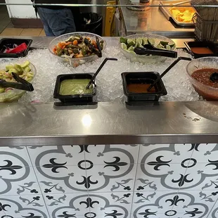 Salsa bar is so good. Good variety and we love the pickled cucumbers and pickled red onions!