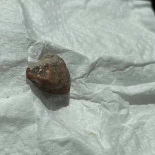 a piece of food on a piece of paper