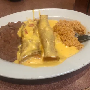 Cheese quesadilla and rice and beans on the side